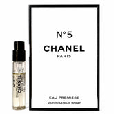 CHANEL No.5 vial front view showing elegant label and compact size, perfect for travel