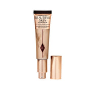 Charlotte Tilbury front bottle showing elegant packaging and instant glow benefit