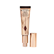 Charlotte Tilbury front packaging shows elegant bottle and brand polish