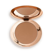 Charlotte Tilbury compact front view showing refillable design and chic finish