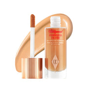 Charlotte Tilbury front packaging showing bottle and brand, conveys luxe radiance