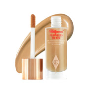 Charlotte Tilbury front packaging showing bottle and branding, evokes premium glow