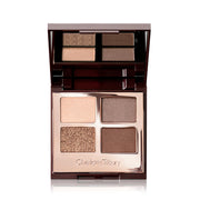 Charlotte Tilbury quad front pan showing four coordinated shades and makeup-ready layout