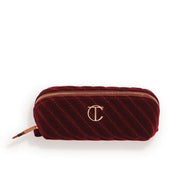 Charlotte Tilbury front view of night crimson quilted velvet bag, stylish protection