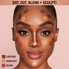 Charlotte Tilbury swatch on wrist illustrating Pillow Talk Medium warmth and natural glow