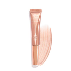 Charlotte Tilbury front packaging showing sleek wand and shade for instant radiance