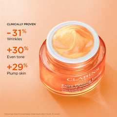 CLARINS open jar texture visible to show lightweight cream absorption benefit