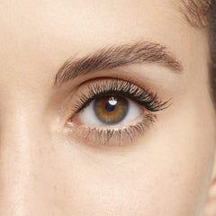Clarins mascara applied on model showing lifted lashes and natural-looking fullness benefit