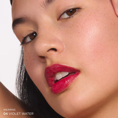 CLARINS Violet Water on lips demonstrating wearable purple hue and matte finish