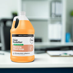 Clean Revolution pouring refill into dispenser illustrating easy refill and less waste