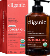 Cliganic bottle front view showing organic jojoba oil, simple and pure benefit