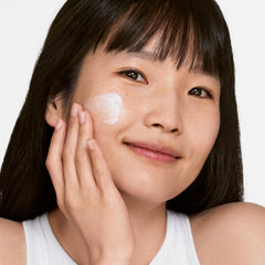 Clinique label close-up showing ingredient highlights and product claims