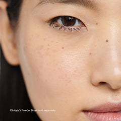 Clinique powder applied with brush demonstrating even, lightweight setting