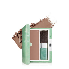 Clinique compact front view showing Totally Tawny and included brush for quick application