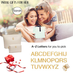 CLOUDWINGS close-up metal initial detail highlighting custom monogram benefit