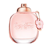 Coach front bottle view showing elegant design and wearable floral scent