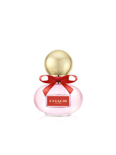 Coach Poppy front bottle showing elegant packaging and bright design for daily wear
