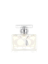 Coach signature front bottle showing elegant packaging and polished luxury