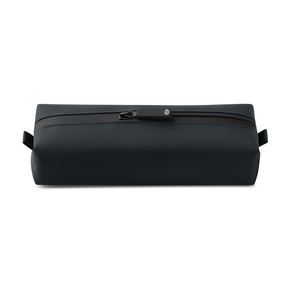 Comfyable front view showing compact dark gray dopp kit and easy carry benefit