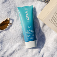 COOLA applied on arm demonstrating quick absorption and non-greasy finish