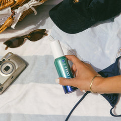 COOLA texture shot with coconut and aloe droplets for cooling hydration benefit