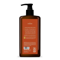 Cremo bottle in shower lifestyle scene showing Golden Amber scent elevating daily routine