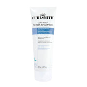 CURLSMITH front bottle view showing clean curl-friendly packaging and clarity benefit