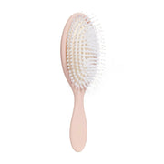 DAE brush front view showing ergonomic shape and styling benefit