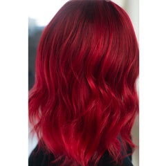 Danger Jones Diablo applied on dark hair demonstrating vibrant red payoff for contrast