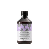 Davines calming shampoo front bottle showing soothing packaging and gentle formula