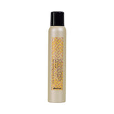 Davines front packaging showing product identity and easy spray use