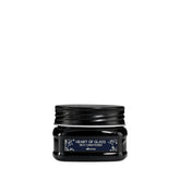 Davines travel conditioner front view showing compact packaging and brand benefit