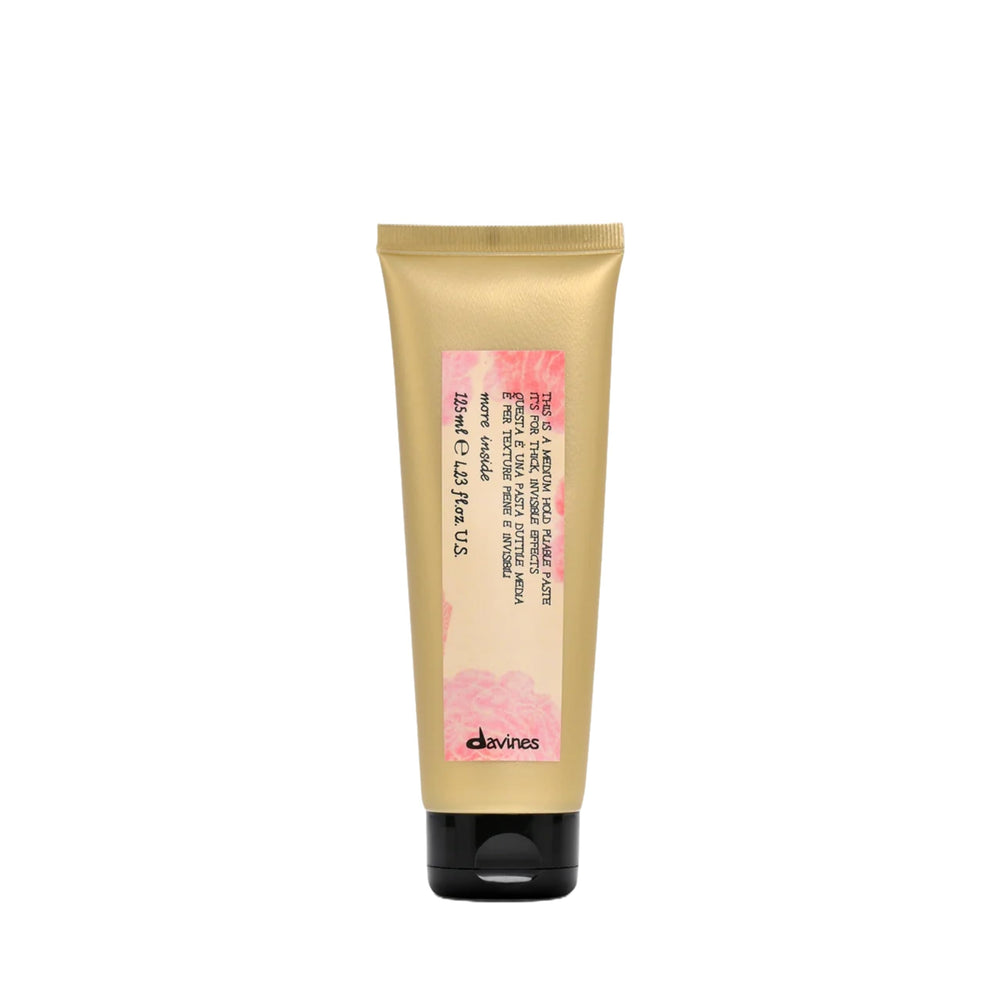 Davines jar front view showing medium-hold paste, elegant packaging benefits styling routine