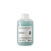 Davines MINU front bottle showing product and benefit of color protection