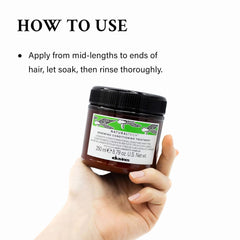Davines treatment being applied in shower for smoother, easier styling