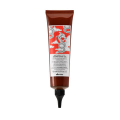 Davines Naturaltech bottle front view showing product benefits and design