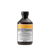 Davines front bottle view showing product branding and gentle cleanser benefit