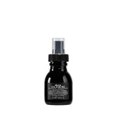 Davines front bottle view showing OI All In One Milk and easy handling benefit