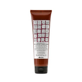 Davines replumping conditioner front packaging shows product and benefit of lightweight hydration