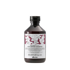 Davines replumping shampoo bottle front view showing premium packaging and salon-grade performance