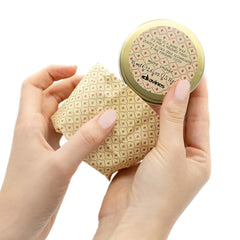 Davines cream on fingers demonstrating easy emulsification and control