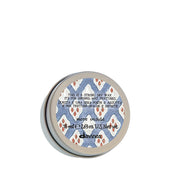 Davines jar front packaging showing bold product name and matte benefit