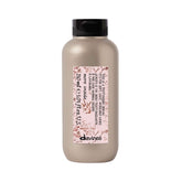 Davines bottle front view showing sleek packaging and easy application benefit