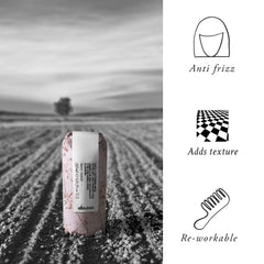 Davines serum in hand demonstrating easy application and lightweight feel