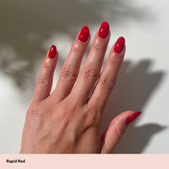 Applying Dazzle Dry lacquer on nails demonstrating fast, neat application