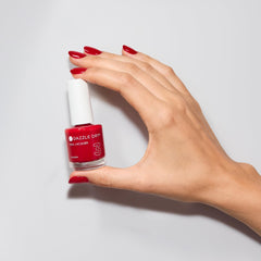 Dazzle Dry Rapid Red swatch on fingernail showing true red finish