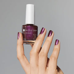 Dazzle Dry swatch on skin demonstrating true Spiced Plum shade and depth