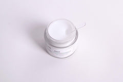 DearKlairs sleeping mask applied beside bed lamp demonstrating overnight nourishment