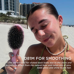 Denman cushioned base profile providing flexible pressure and scalp comfort
