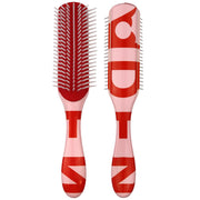 Denman D3 front view showing seven rows and ergonomic handle for controlled styling